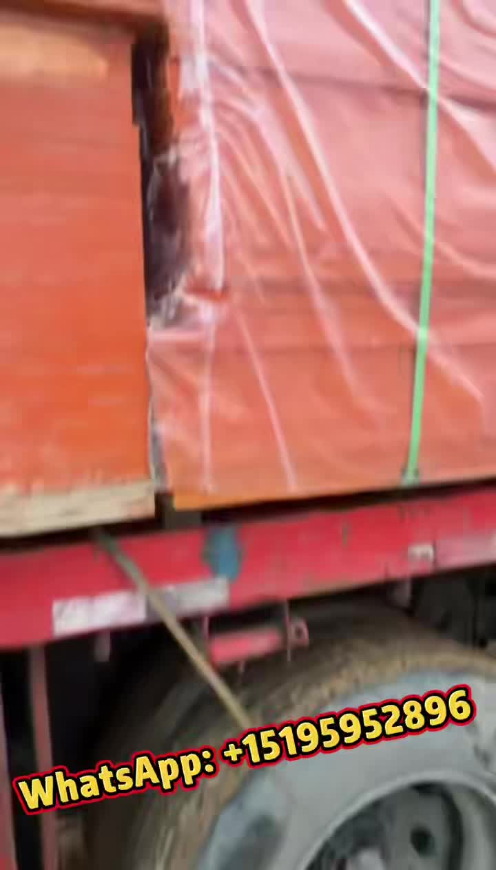 Close-up of wrapped board stack on truck bed